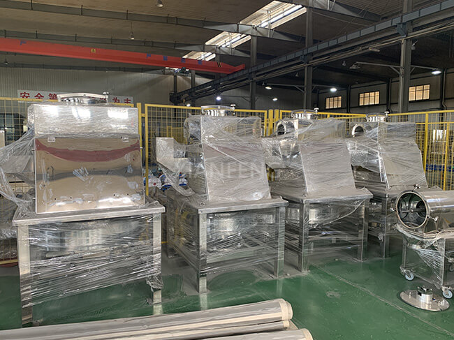 Multiple Dust-Free Loading Stations Workshop Scene - Real Image for Synchronized Hygienic Feeding in Industrial Lines