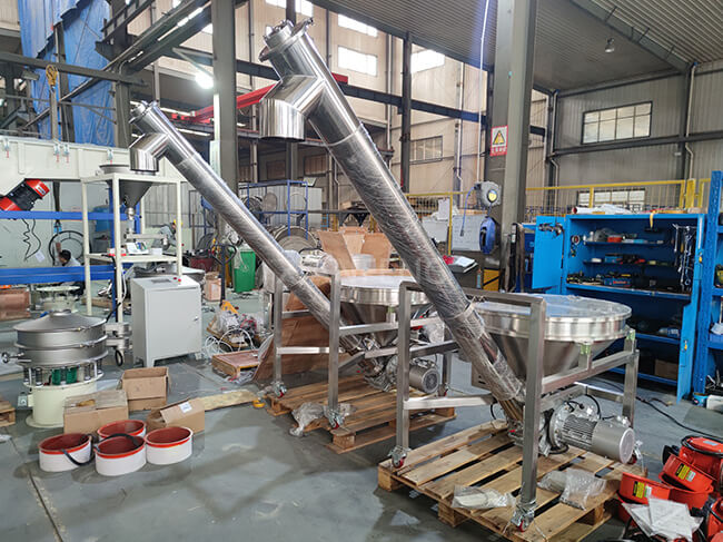 Workshop Real Photo of Two Inclined Screw Conveyors - Efficient Dual-Unit Setup for Inclined Bulk Material Conveying